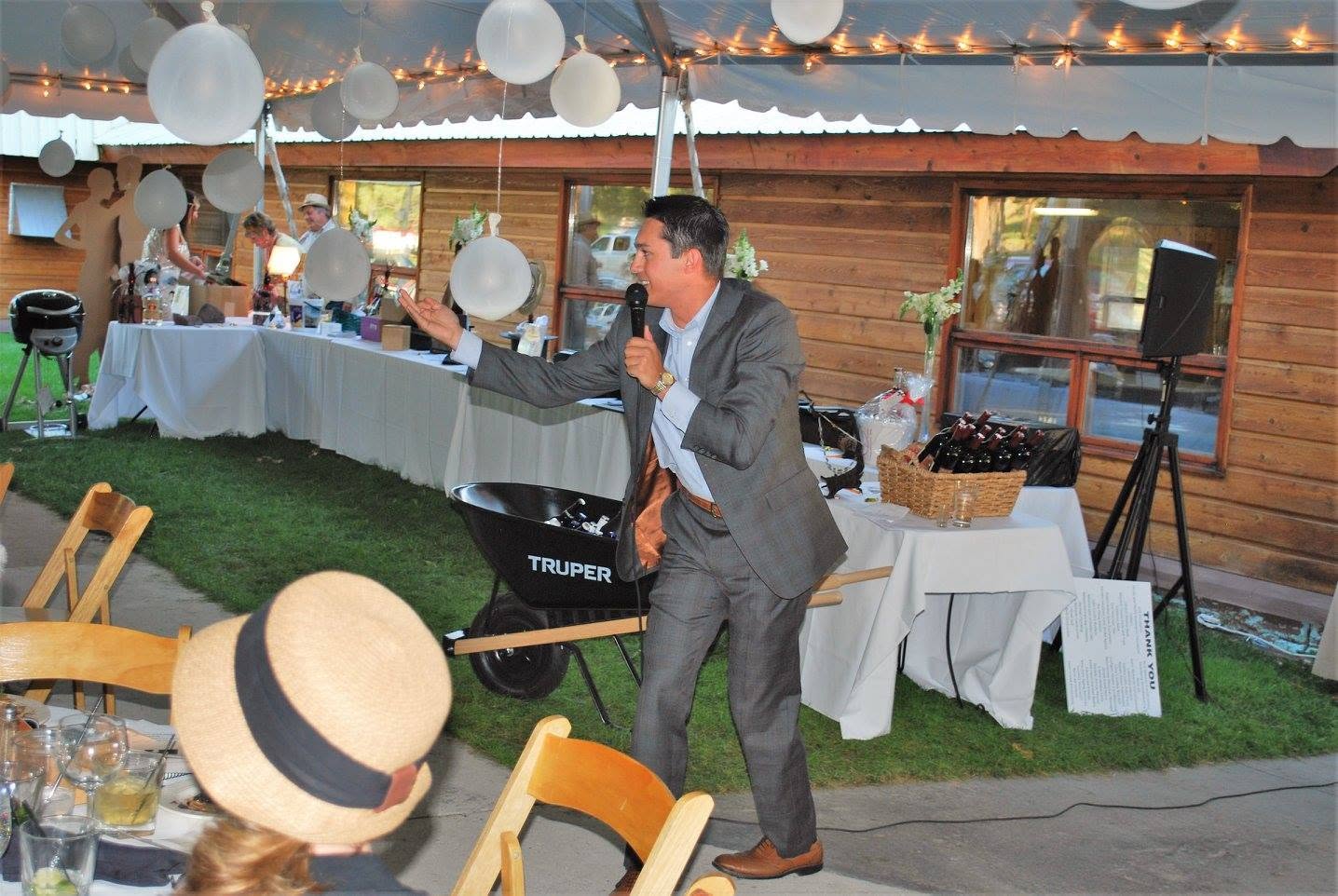 Auctioneer evaluating the room